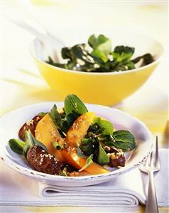 Duck liver on corn salad with fruit