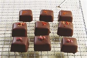 Chocolates with pink pepper, chilies and chili powder