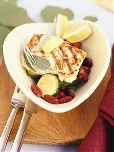 Grilled cod filet with courgettes, beans and sage