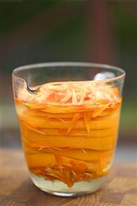 Marigold liqueur with orange slices