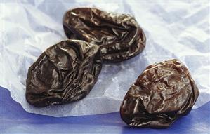 Three prunes on paper