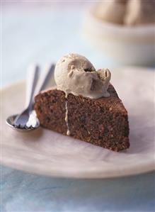 Piece of chocolate hazelnut cake with ice cream