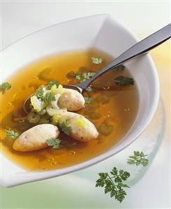 Ham and Parmesan dumplings in beef broth