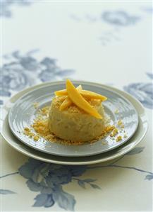 Coconut ice cream with caramel and mango
