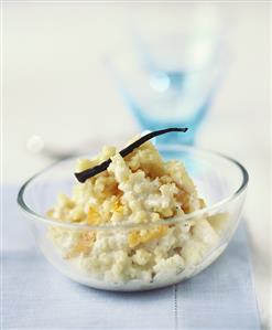 Rice pudding with fruit and vanilla pod