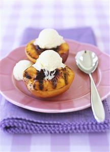 Grilled nectarine halves with vanilla ice cream
