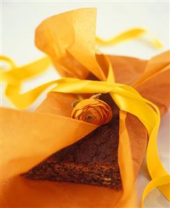 Banana cake with paper and ribbon