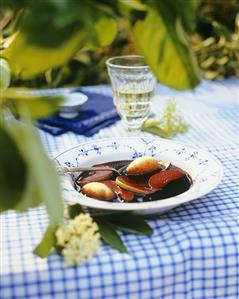 Elderberry and apple soup with semolina dumplings