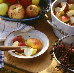 Still life with apples and elderberries