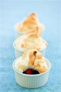 Raspberry and blueberry dessert with meringue topping