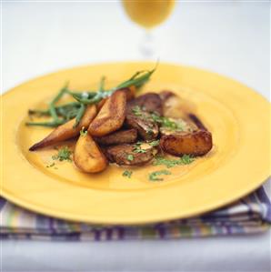 Beef steak with roasted pears and beans