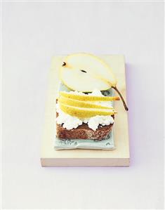 Wholemeal bread with soft cheese and pear