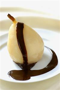 Poached pear with chocolate sauce