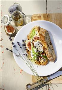 Crusty bread with figs, goat's cheese and lavender honey