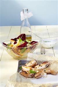 Honeydew melon salad with grilled squid