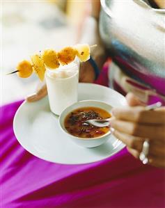 Mandarin granita with raspberries and basil