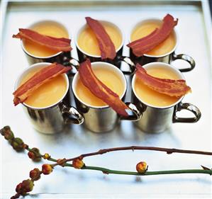 Pumpkin cream soup with fried bacon rashers