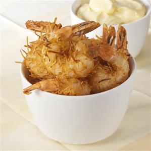 Shrimps fried in coconut batter with lemon mayonnaise