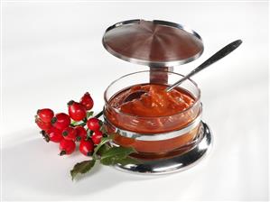 Rose hip jam in a small bowl