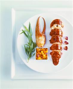 Lobster with mango salsa and sprig of tarragon