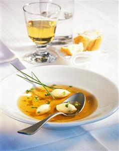 Cep consommé with Parmesan dumplings