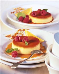 Orange custard with raspberries