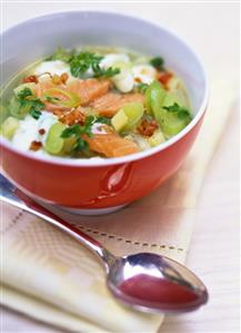 Potato and leek soup with salmon and bacon