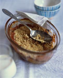 Plum crumble in baking dish