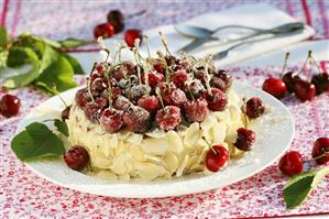 Sponge cake with sugared cherries