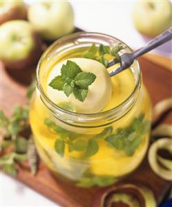 Apples bottled in mint syrup