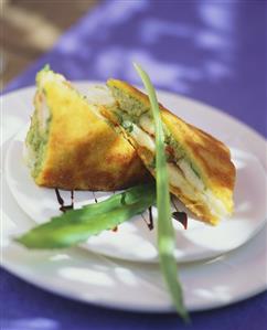 Breaded shrimp and pineapple slices with herb paste