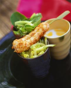 Scampo with red curry paste and fried apple julienne