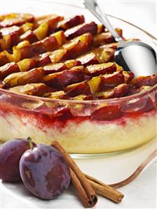 Baked rice pudding with damsons and raisins