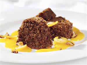 Hazelnut and pumpernickel pudding with fruit sauce