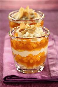 Layered dessert with peach compote and mascarpone cream