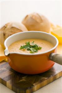 Vegetable cream soup with bread rolls