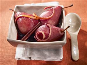 Poached pears in red wine with orange peel & cinnamon stick