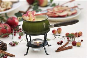 White chocolate fondue with cinnamon apples