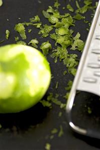 Lime, lime peel and grater