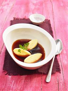 Red cabbage consommé with semolina dumplings