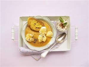 Creamy fish soup with white bread