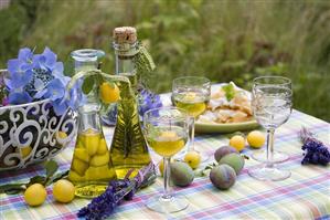 Still life with herb liqueur and mirabelle liqueur