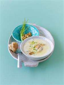 Potato soup with smoked mackerel and walnuts