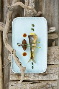 Fried mackerel fillet on polenta with tomato & date tartare