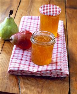 Pear and grape jam in two screw-top jars