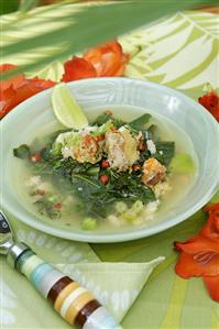 Crab soup with vegetables and lime