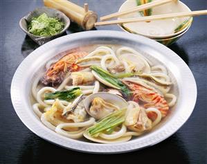 Udon soup with shrimps, shellfish and eel (Japan)