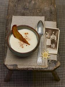 Wine soup with slice of toasted bread