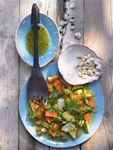 Papaya salad with lime dressing out of doors (Caribbean)