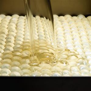 Making jewel-shaped chocolates in a factory